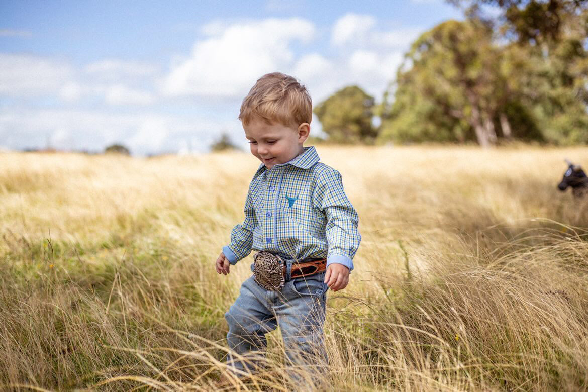Children wearing unique, high-quality slow fashion clothing promoting sustainability and ethical production.
