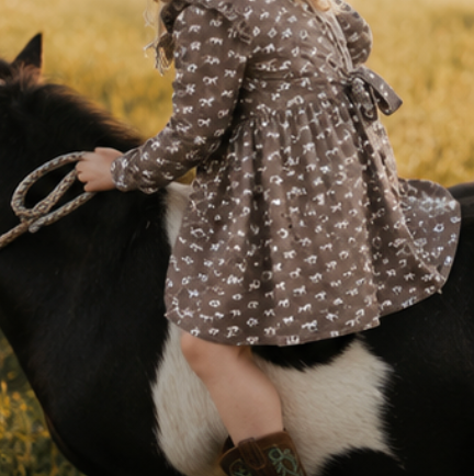 Miley horse print chocolate dress neckline detail showing elegant neckline on chocolate horse print dress