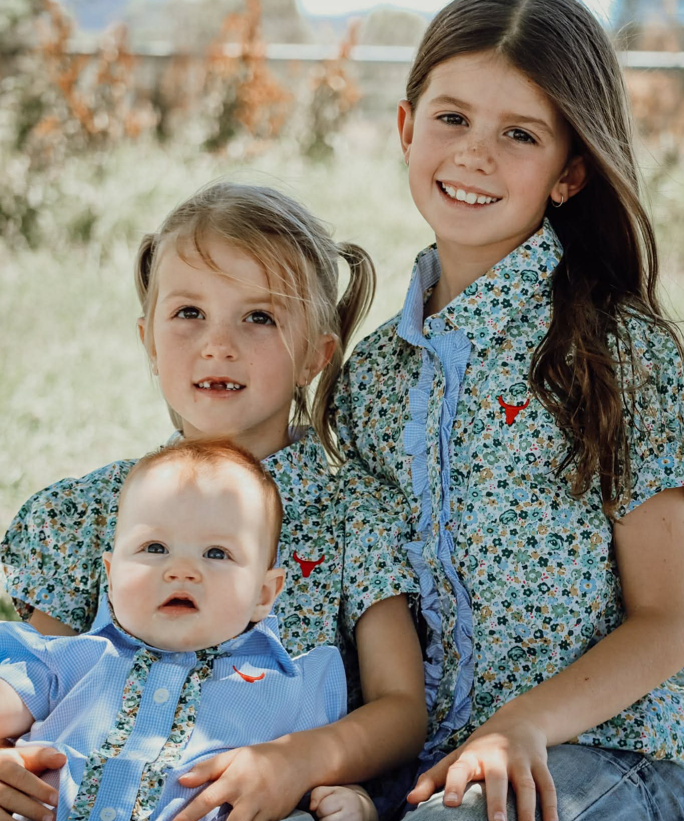Dorothy soft blue floral sleeve blouse front view showing delicate blue floral sleeve blouse for girls