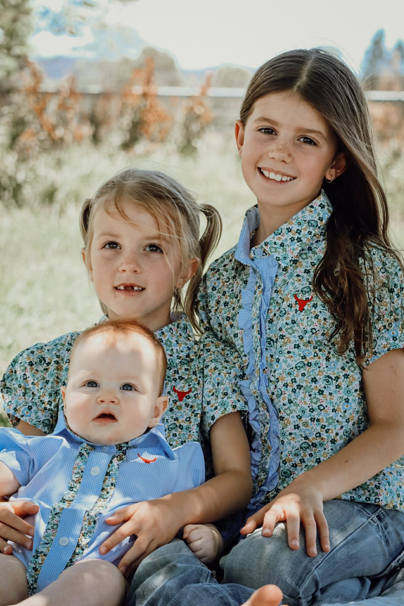 Dorothy soft blue floral sleeve blouse front view showing delicate blue floral sleeve blouse for girls