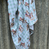 Teal cowgirl jersey organic cotton swaddle showing soft teal cowgirl print on 100% organic cotton