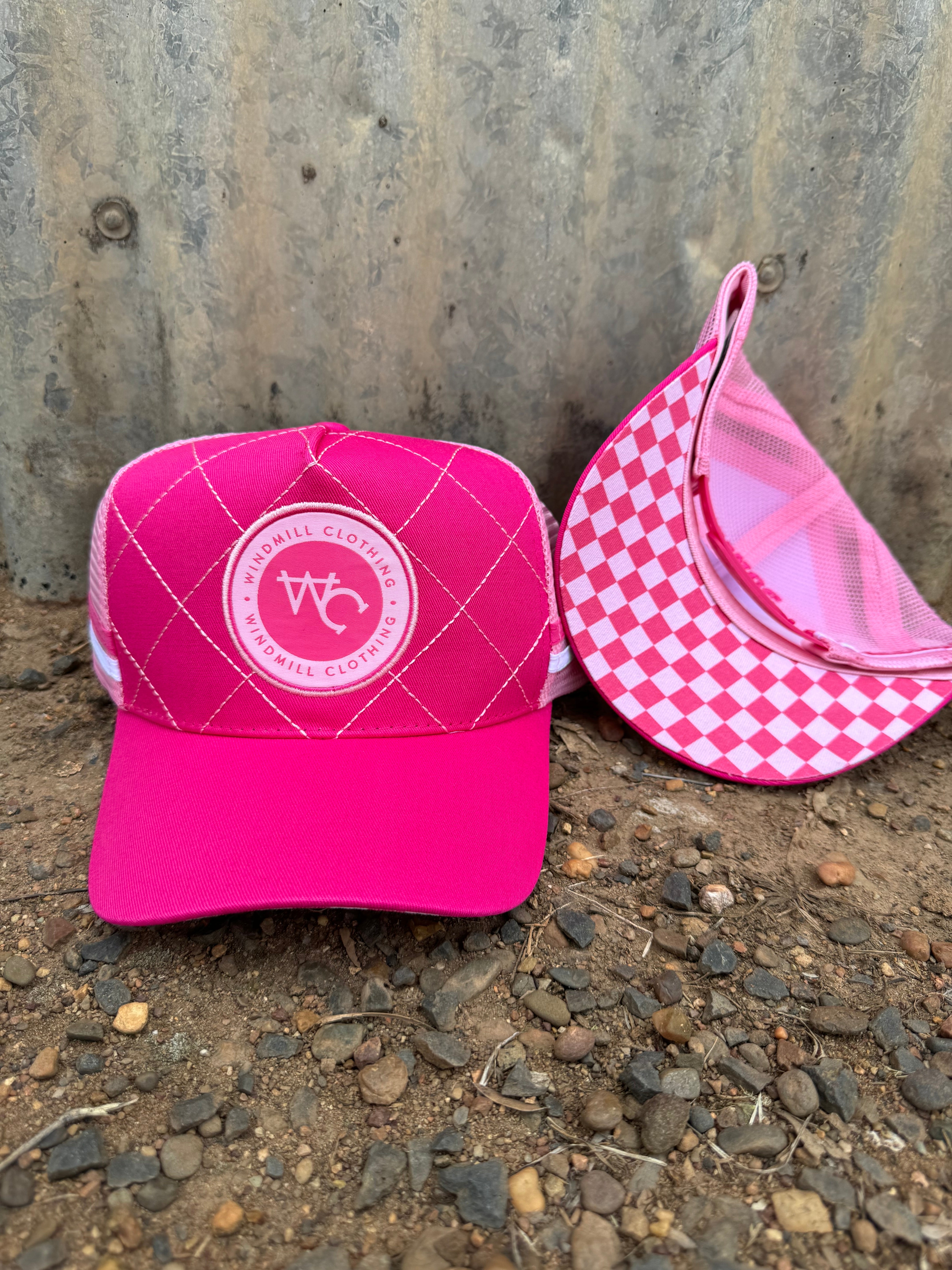 Hot pink quilted cap side profile showing structured quilted design and comfortable brim