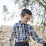 Boy in blue plaid shirt