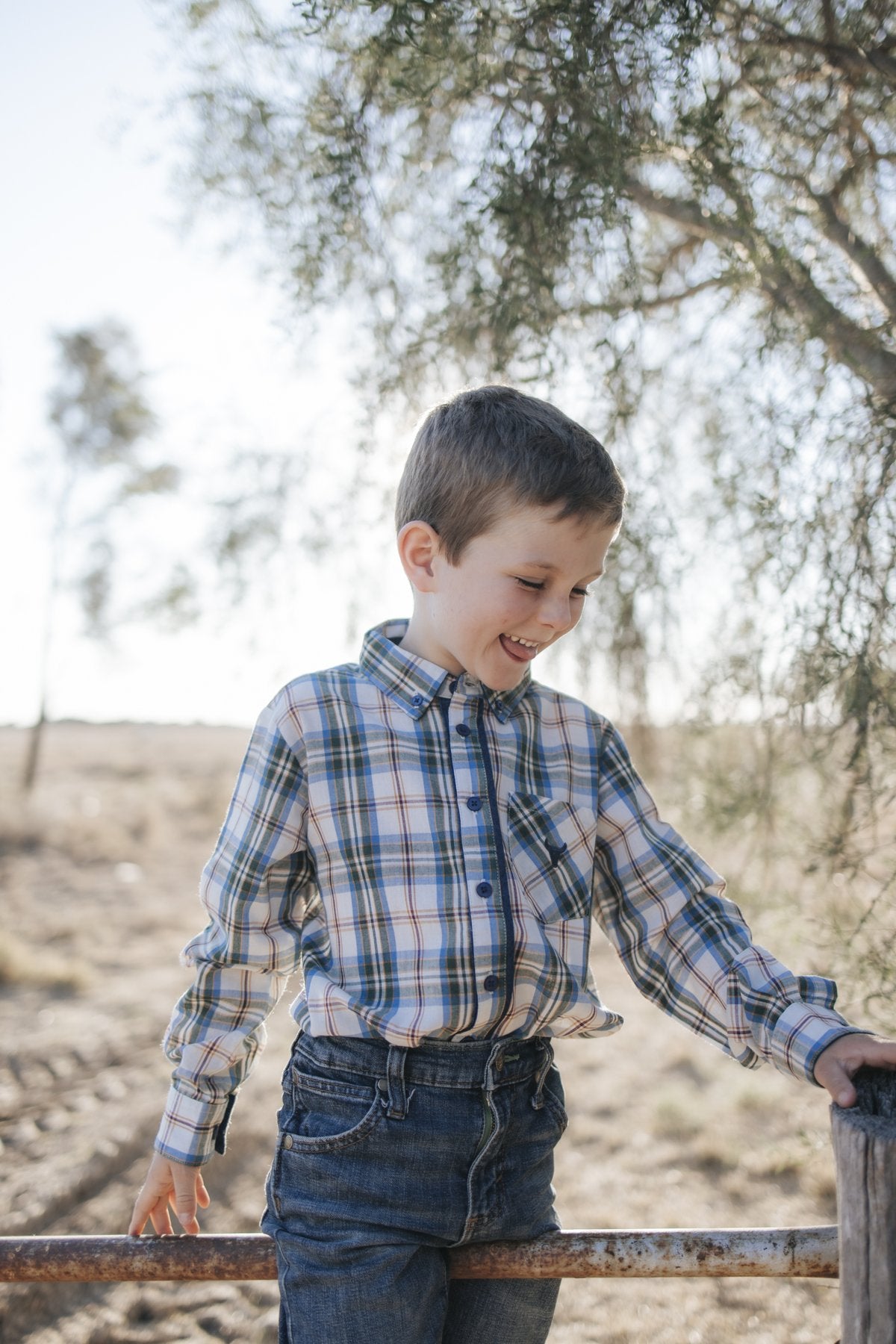 Boy in blue plaid shirt