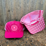 Hot pink quilted cap front view showing stylish quilted pattern in vibrant hot pink for all ages