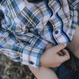 Blue plaid shirt button and cuff detail