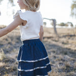 Girls three-tier denim skirt with plaid piping