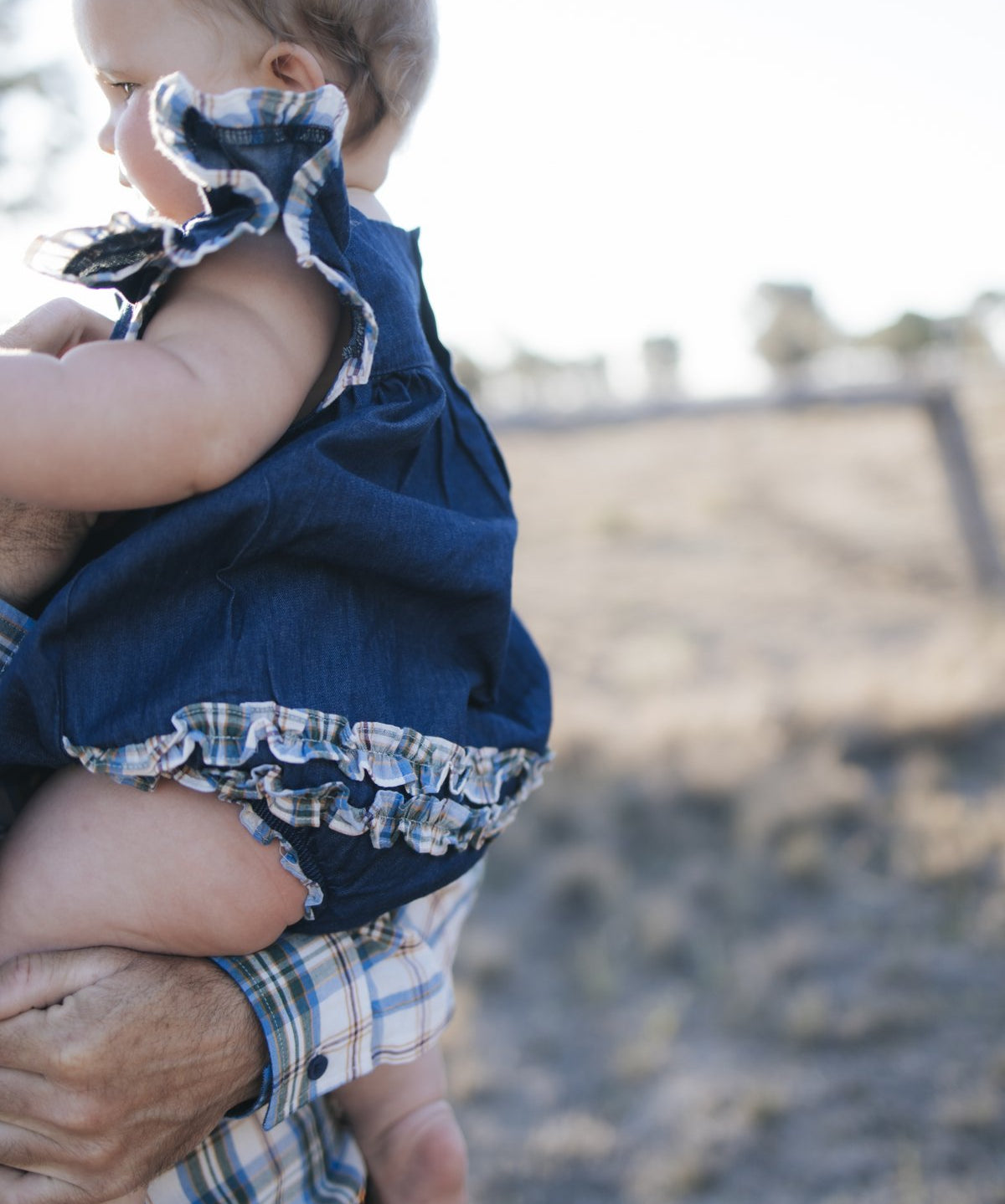 Denim romper with blue plaid frill sleeves