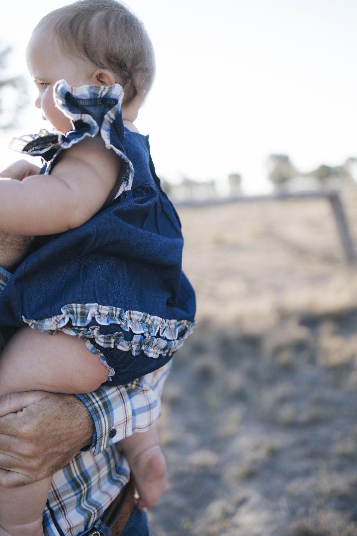 Denim romper with blue plaid frill sleeves
