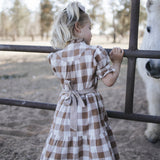 Girls brown gingham dress back view with waist tie