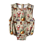 Christmas romper front view showing festive holiday print romper for baby