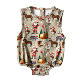 Christmas romper front view showing festive holiday print romper for baby