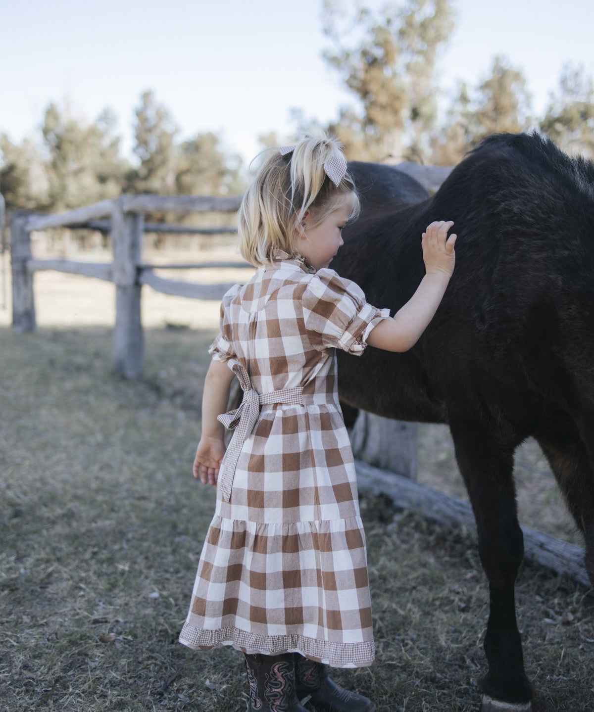 Girls tiered brown gingham dress with puff sleeves