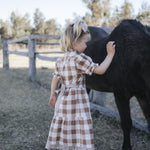 Girls tiered brown gingham dress with puff sleeves