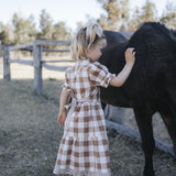 Girls tiered brown gingham dress with puff sleeves