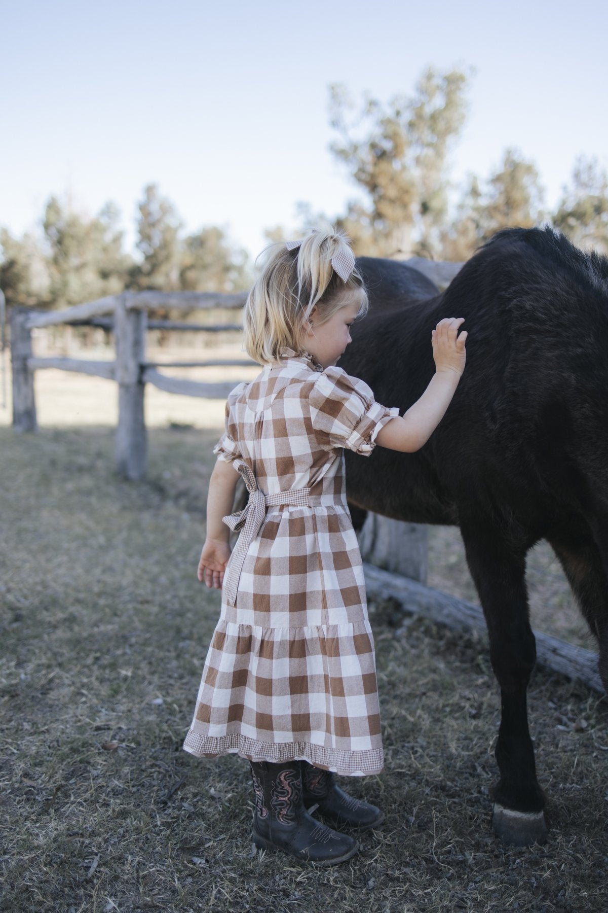 Girls tiered brown gingham dress with puff sleeves