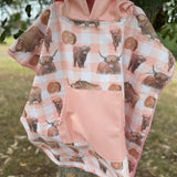 Peach Highlander kids waffle towel folded showing compact peach highlander print kids towel