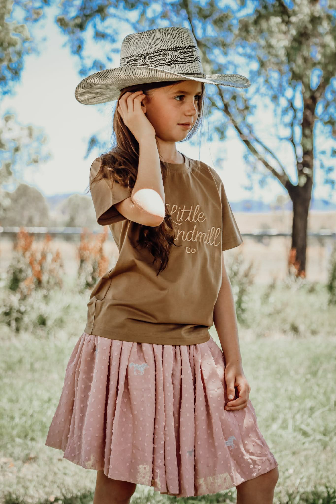 Bella soft dust pink textured tutu side view showing full layered volume in soft dust pink