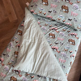Country Outback nursery set showing cot quilt with removable insert in exclusive country print