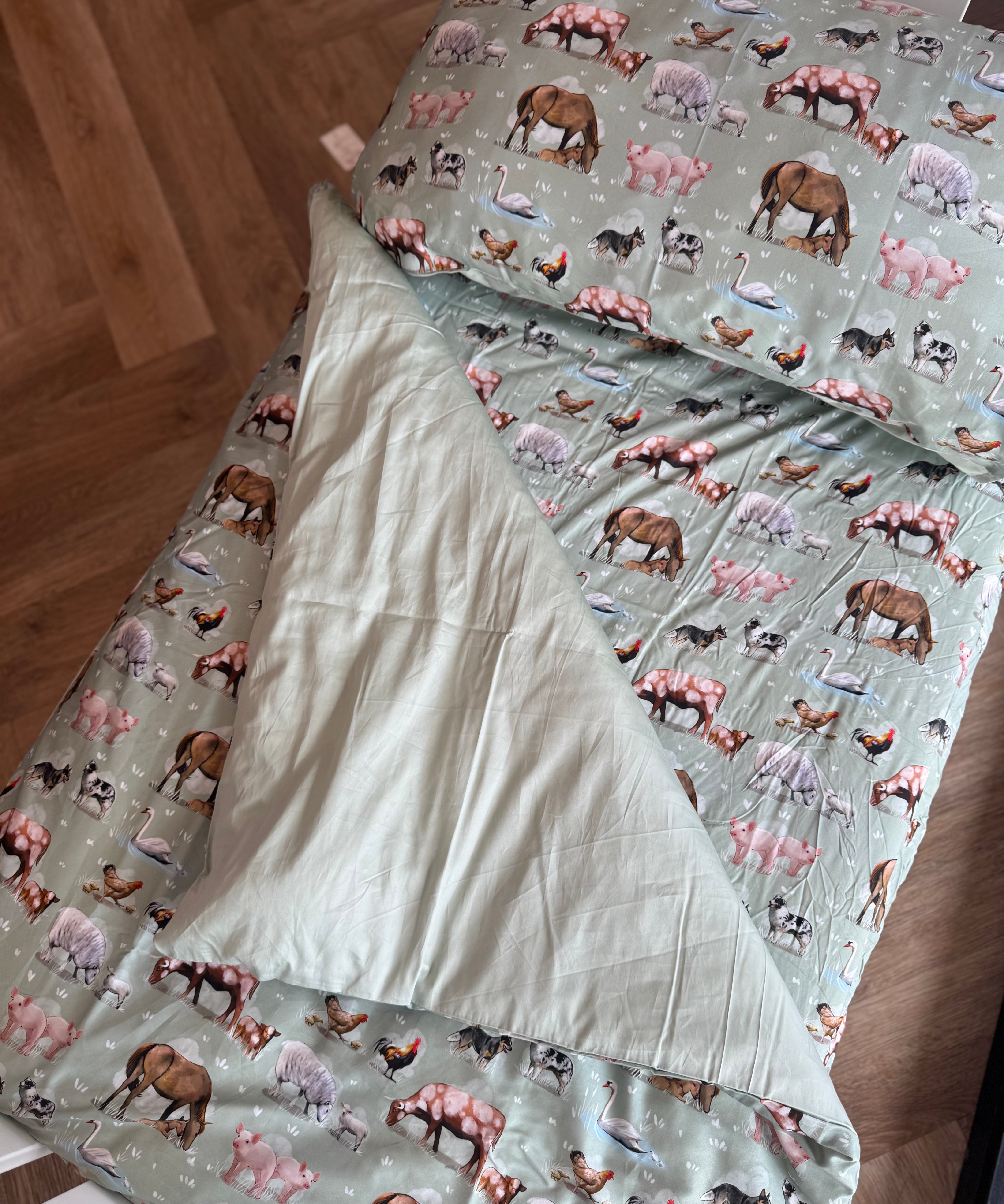 Country Outback nursery set showing cot quilt with removable insert in exclusive country print