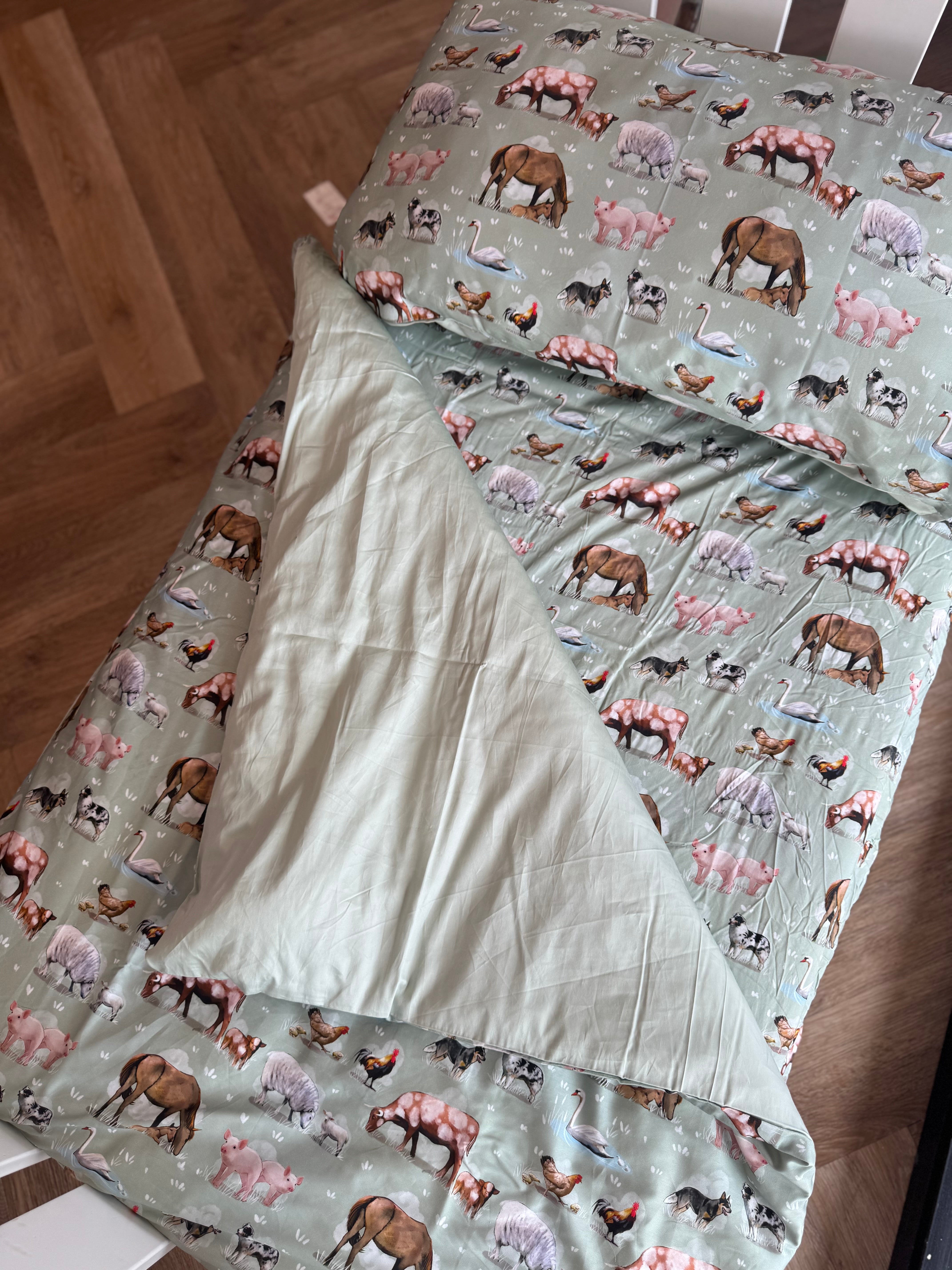 Country Outback nursery set showing cot quilt with removable insert in exclusive country print