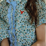 Dorothy soft blue floral sleeve blouse worn by girl showing sweet soft blue floral style
