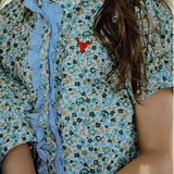 Dorothy soft blue floral sleeve blouse worn by girl showing sweet soft blue floral style