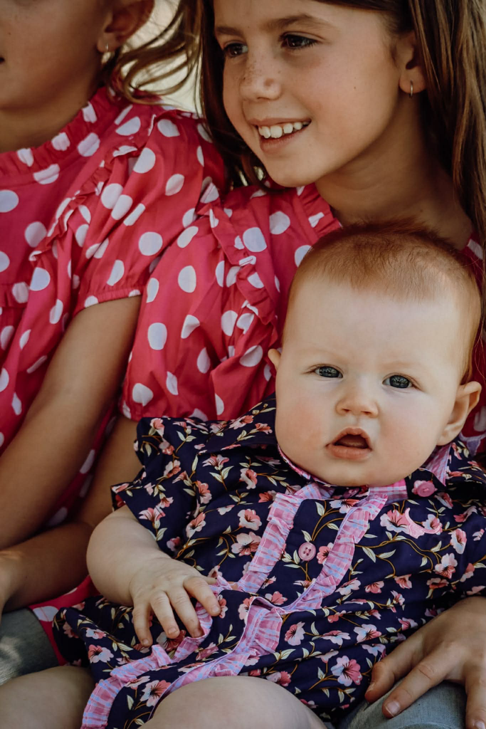 "Harlo" Navy Floral Short Sleeve Romper-Little Windmill Clothing Co