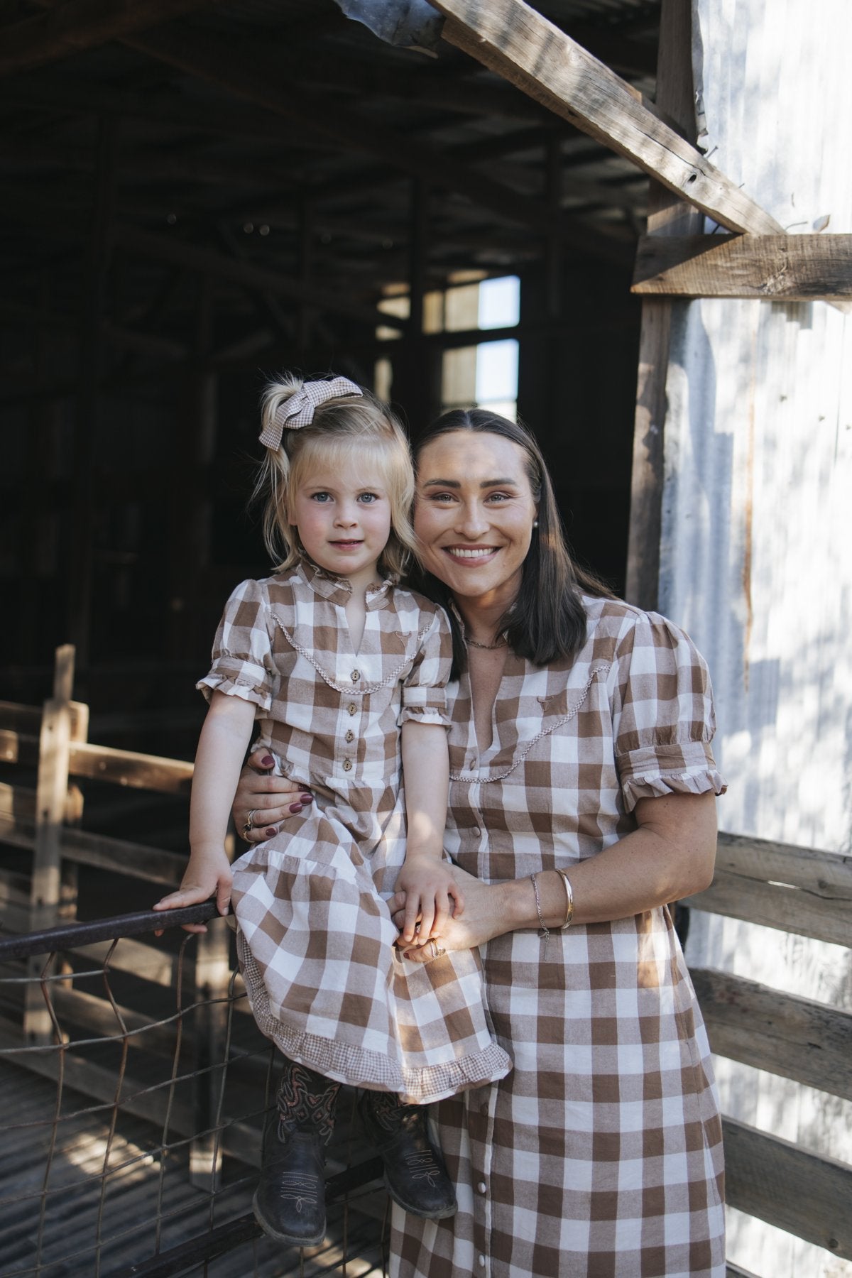 Girls gingham dress worn with matching ladies dress