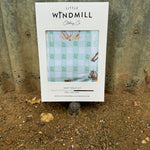 Teal cowgirl organic cotton swaddle draped showing large generous size for swaddling and wrapping