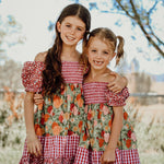 Penelope block twirl dress front view showing vibrant colour block layered twirl dress for girls