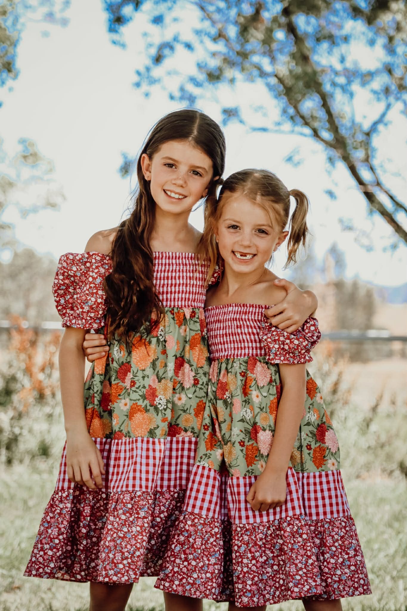 Penelope block twirl dress front view showing vibrant colour block layered twirl dress for girls