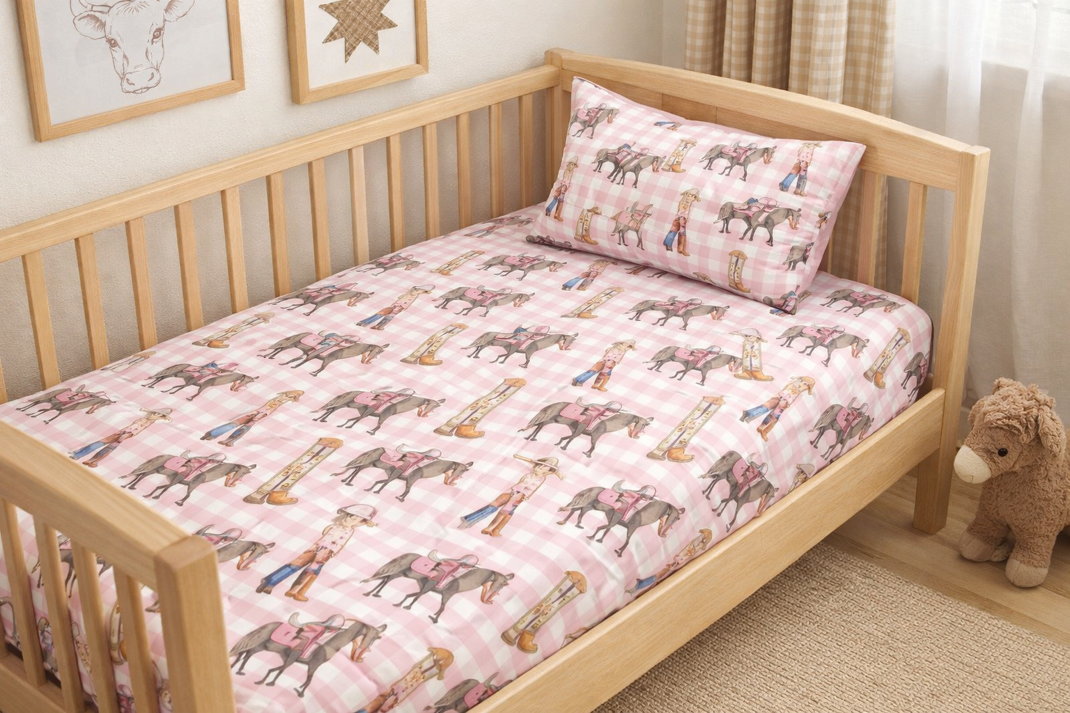 Cowgirl Life fitted cot sheet flatlay showing full cowgirl print design and elastic edge