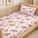 Cowgirl Life fitted cot sheet flatlay showing full cowgirl print design and elastic edge