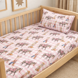 Cowgirl Life fitted cot sheet flatlay showing full cowgirl print design and elastic edge