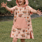 Peach Highlander kids waffle towel front view showing pretty peach highlander print waffle towel for kids