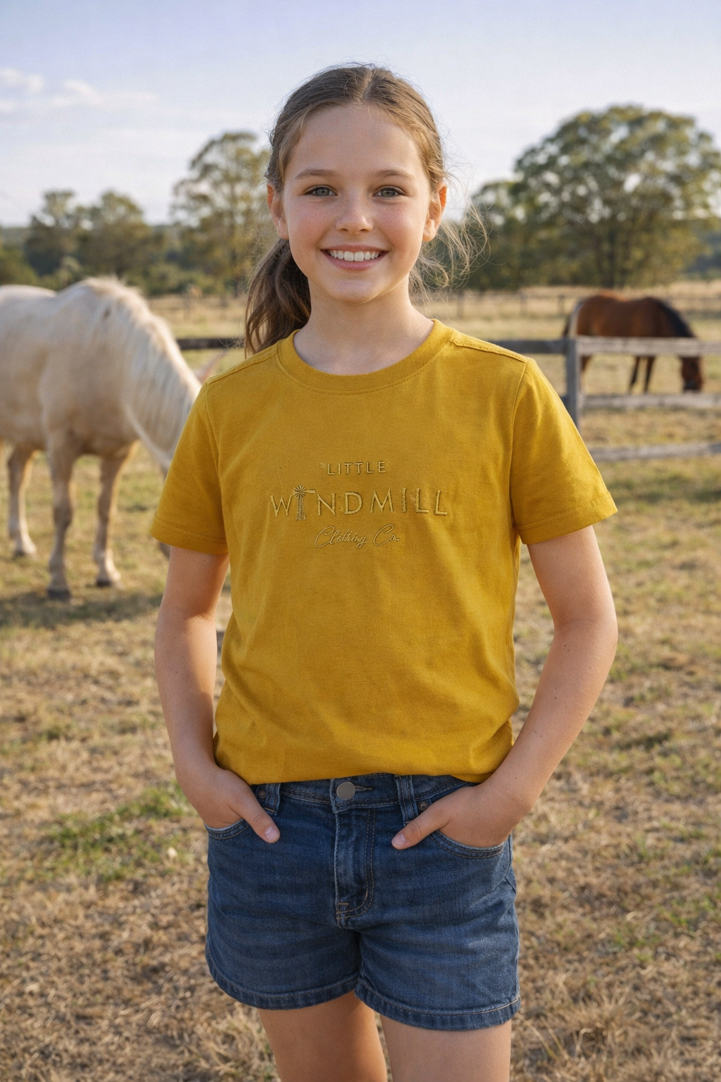 LWCC embroidered kids tee mustard worn by child showing boutique quality country casual style in mustard