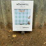 Teal cowgirl swaddle close-up showing adorable cowgirl print detail on premium organic cotton jersey