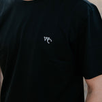 WC Printed Men's Tee Midnight Black flat lay on light surface