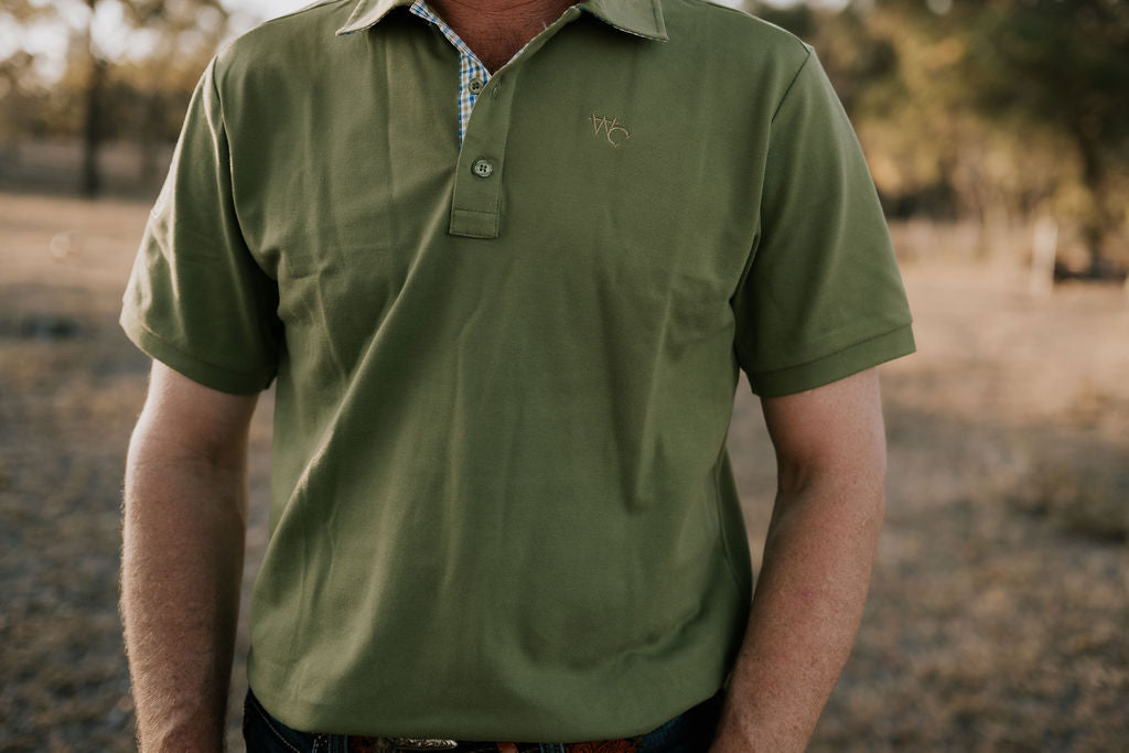 Olive Guy green men's polo back view showing relaxed country fit and olive green colour