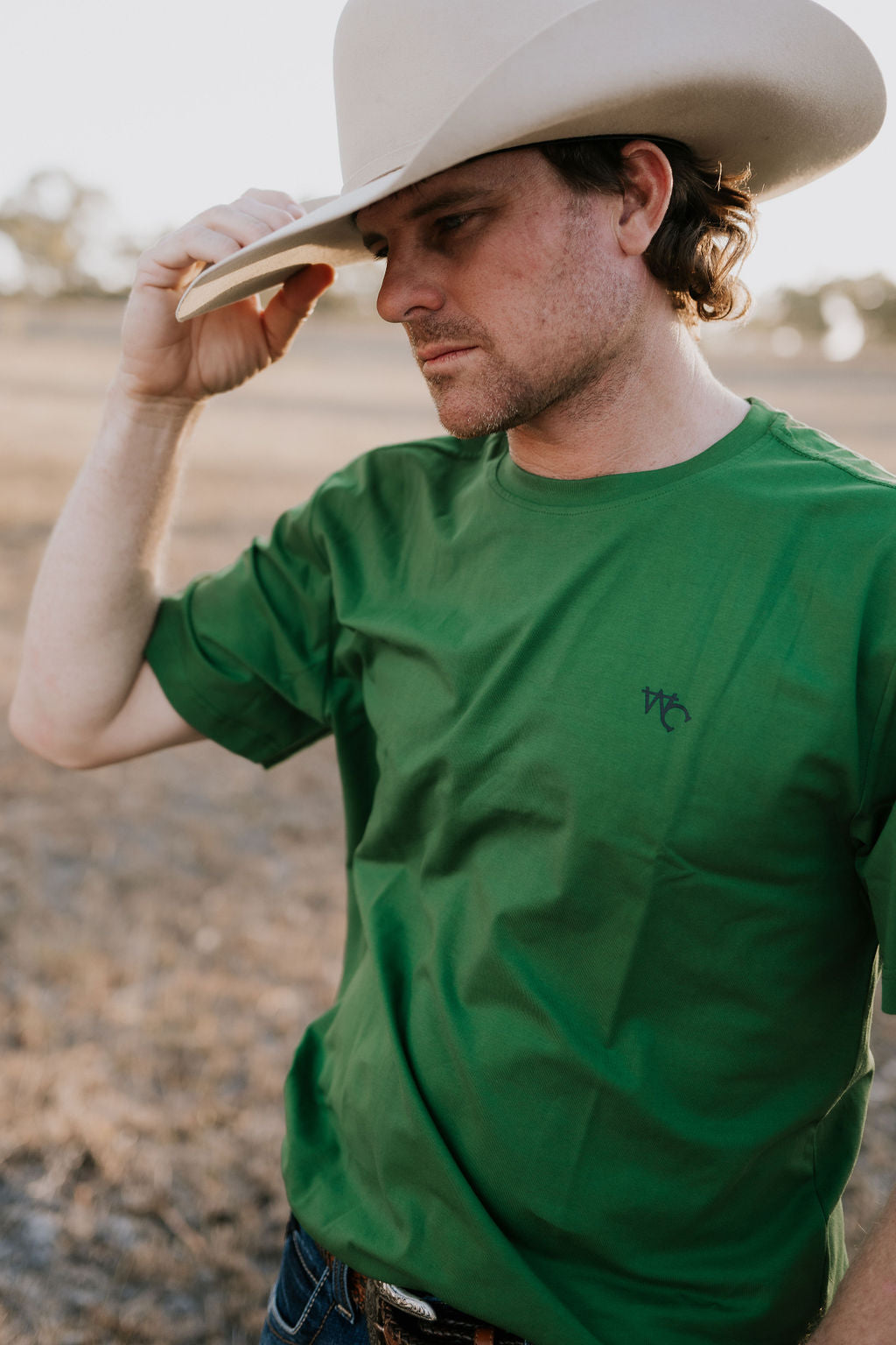 WC Printed Men's Tee Lime flat lay showing graphic print on lime green fabric
