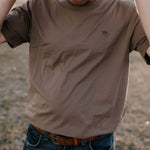 WC Printed Men's Tee Dust on model outdoors showing country casual style