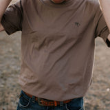 WC Printed Men's Tee Dust on model outdoors showing country casual style