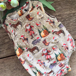 Christmas romper worn by baby showing adorable festive holiday style