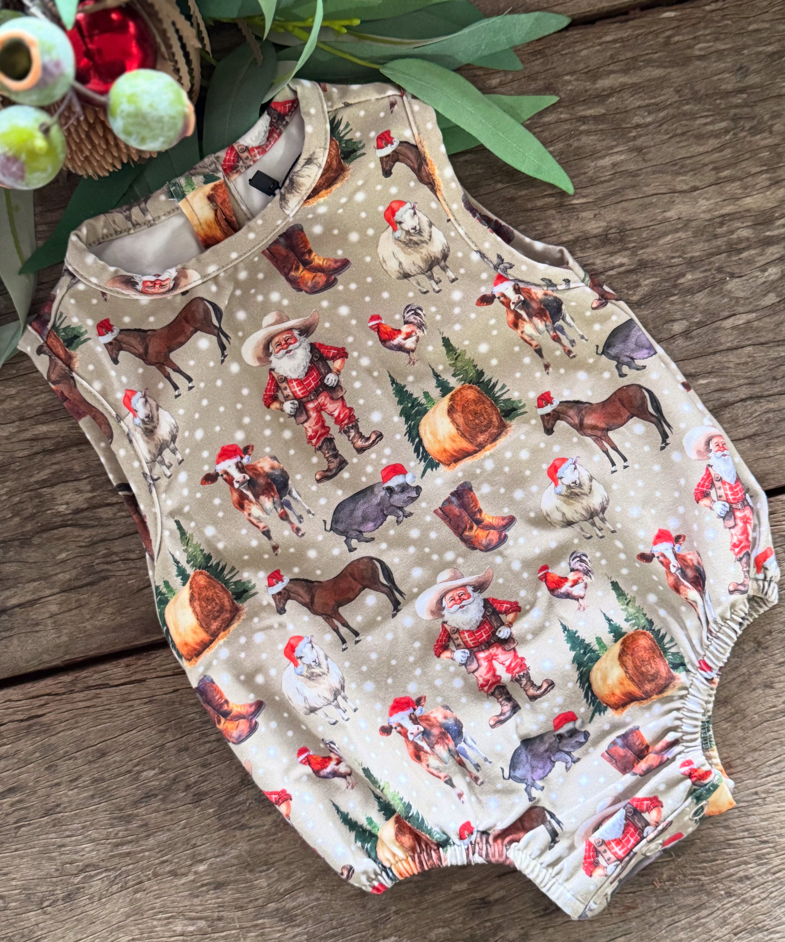 Christmas romper worn by baby showing adorable festive holiday style