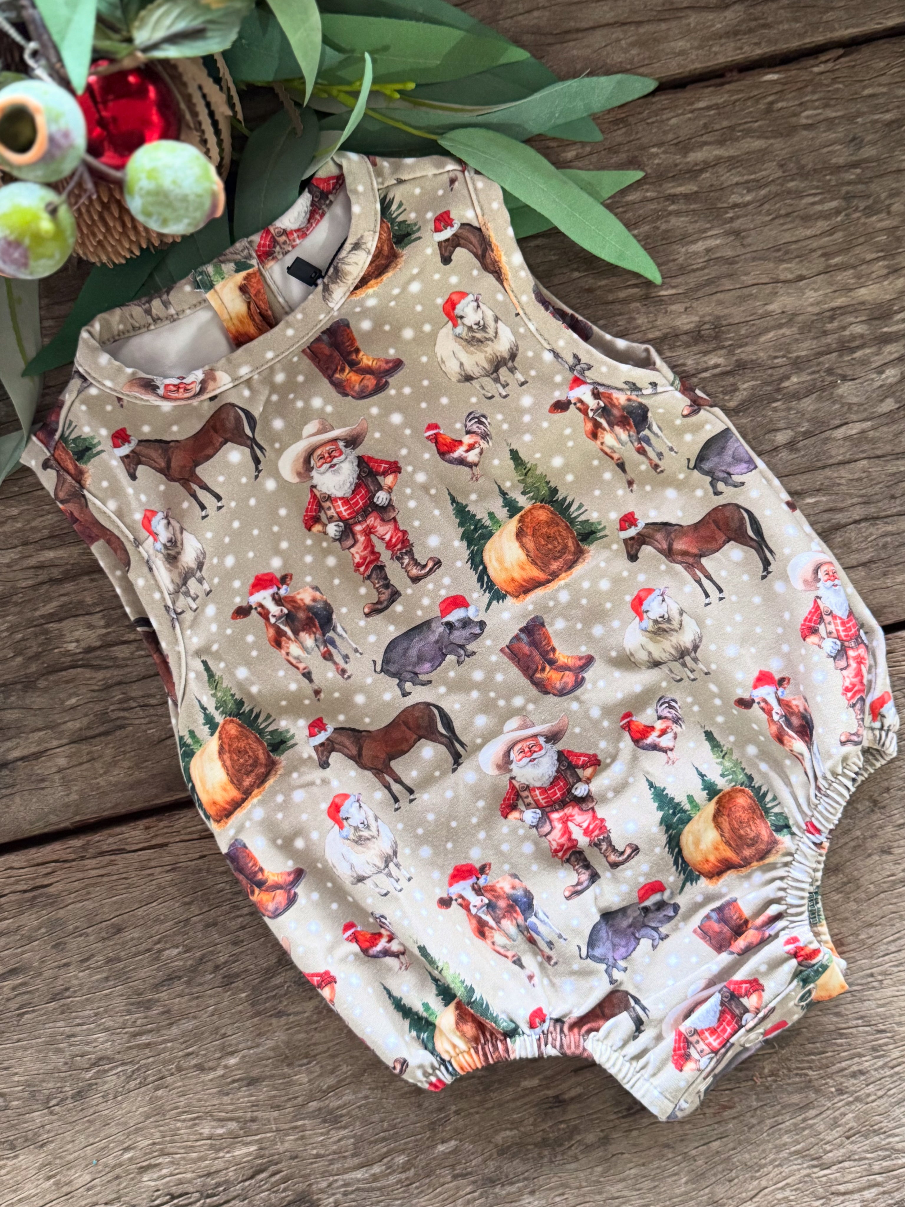 Christmas romper worn by baby showing adorable festive holiday style