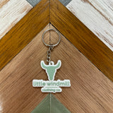 Little Windmill Clothing Co key chain showing branded accessory with windmill logo detail