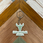 Little Windmill Clothing Co key chain close-up showing quality metal detail and LWCC branding