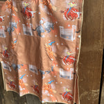 Bull Rider brown kids waffle towel in use showing kids towel with bull rider print