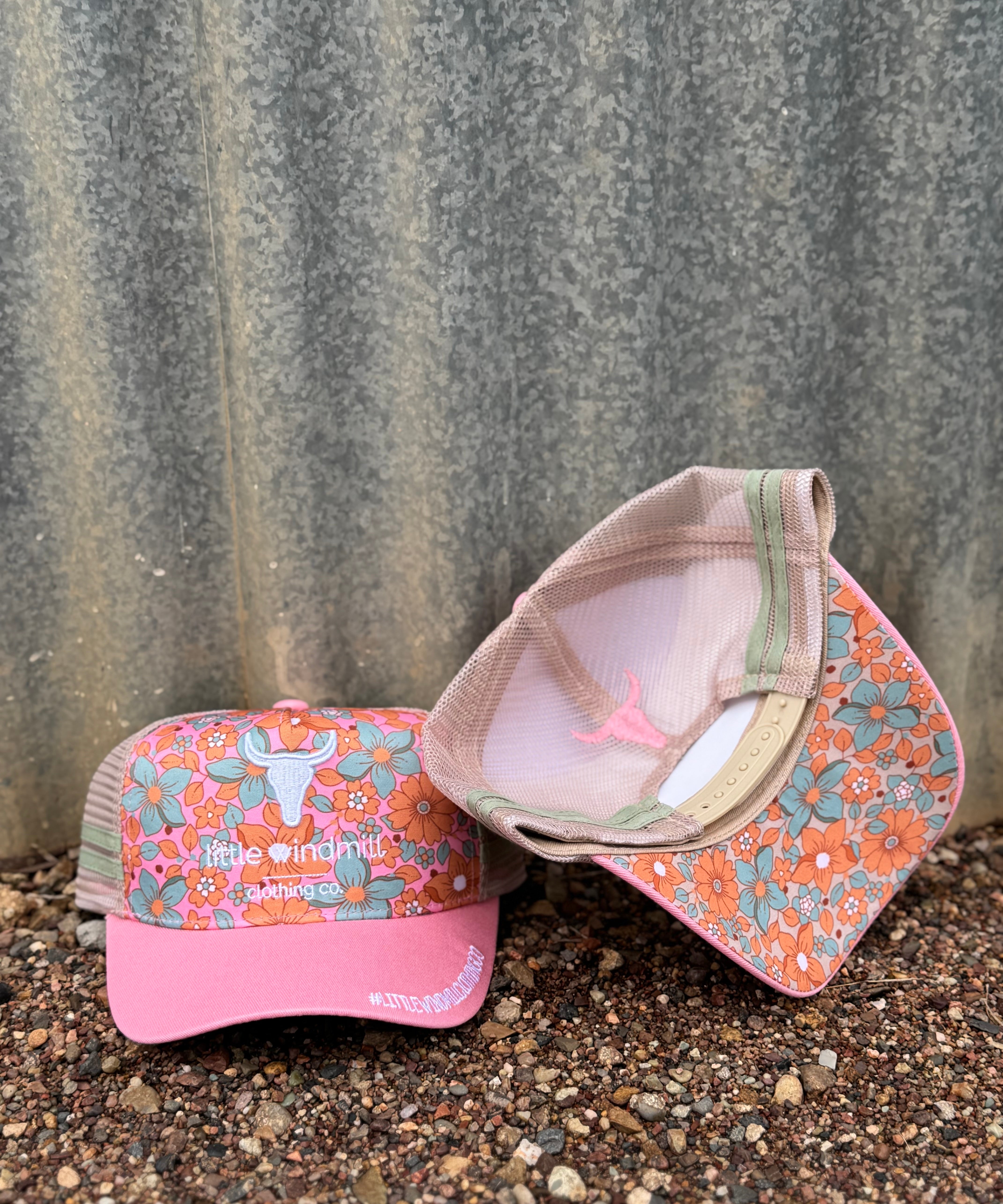 Toddlers and youth floral orange pop cap showing vibrant orange floral print in structured cap style